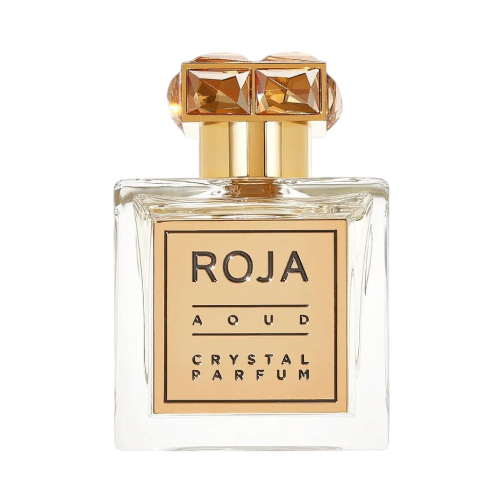 CR Signature Roja Parfums Amber Aoud Crystal Parfum in a clear glass bottle with a gold label and faceted cap.