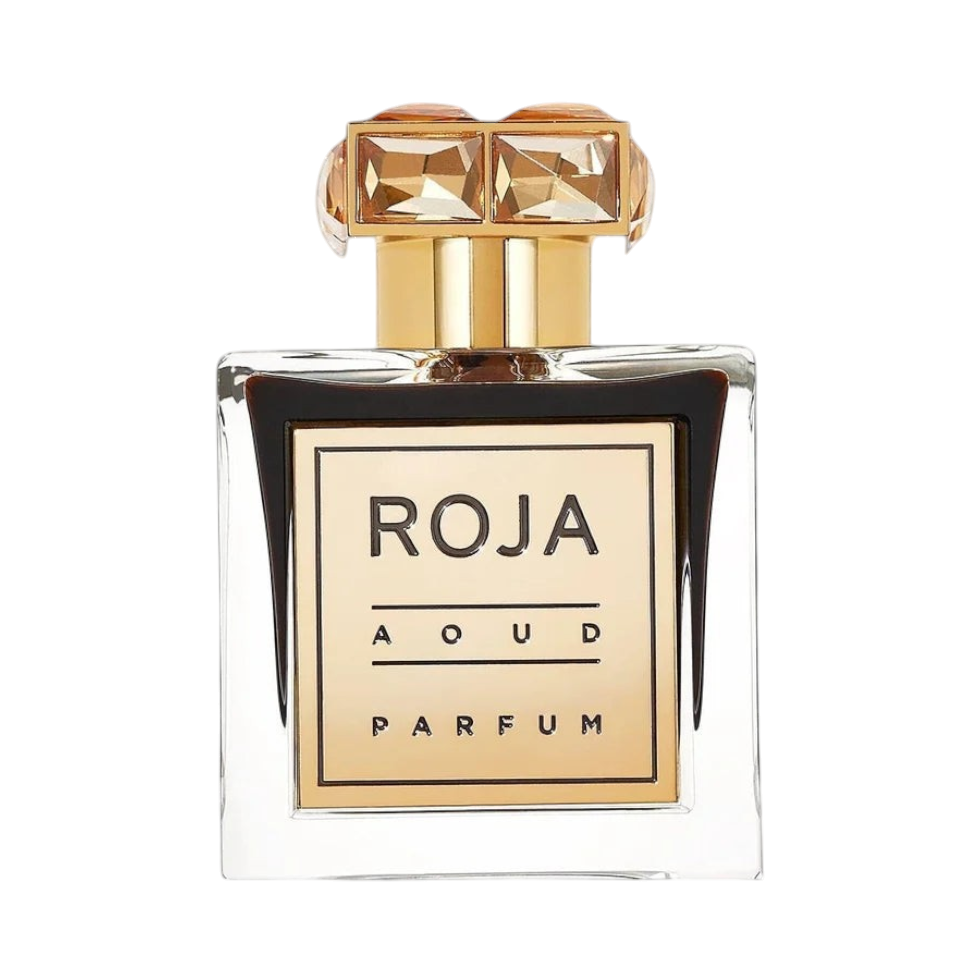 CR Signature Roja Parfums Aoud Parfum in a clear glass bottle with a gold label and ornate crystal-topped cap.