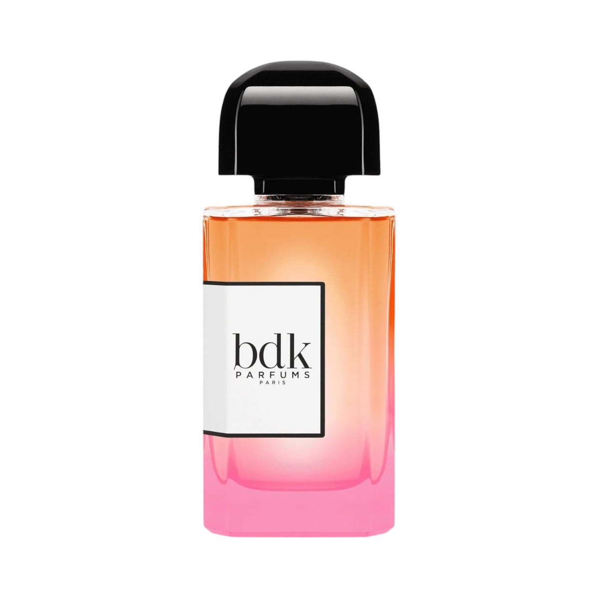 CR Signature BDK Parfums Impadia parfymeflaske med en gradientfarget glassflaske i rosa og oransje mot en mørk bakgrunn.