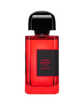CR Signature BDK Parfums Rouge Smoking Extrait de Parfum in a vibrant red glass bottle with a black cap and label.
