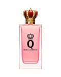CR Signature Dolce & Gabbana Q Eau de Parfum i en rosa glassflaske med en gullfarget krone som kork.