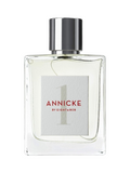 CR Signature Eight & Bob Annicke 1 eau de parfum i en elegant glassflaske med sølvkork mot en mørk bakgrunn
