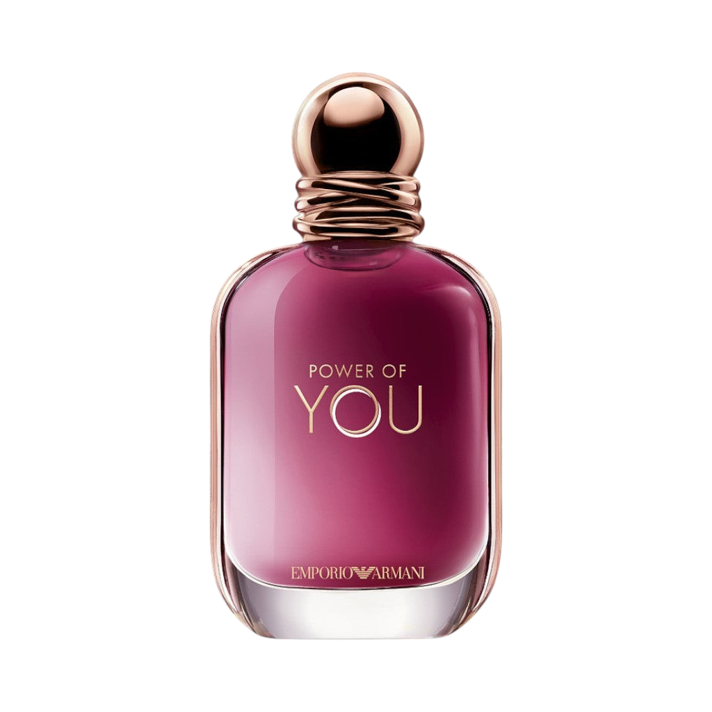 CR Signature Emporio Armani Power of You EdP parfymeflaske i dyp rosa glass med gullkork mot en mørk bakgrunn
