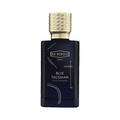 CR Signature Ex Nihilo Blue Talisman Extrait de Parfum i en mørkeblå glassflaske med gullkork mot en støvete bakgrunn.