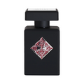 CR Signature Initio Parfums Privés Blessed Baraka Eau de Parfum in a matte black bottle with a red ornate emblem.