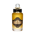 CR Signature Penhaligon's The Dandy Eau de Parfum in a glass bottle with a black bow against a smoky black background.