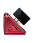 CR Signature Prada Paradoxe Radical Essence Parfum in a triangular red glass bottle with a black cap.