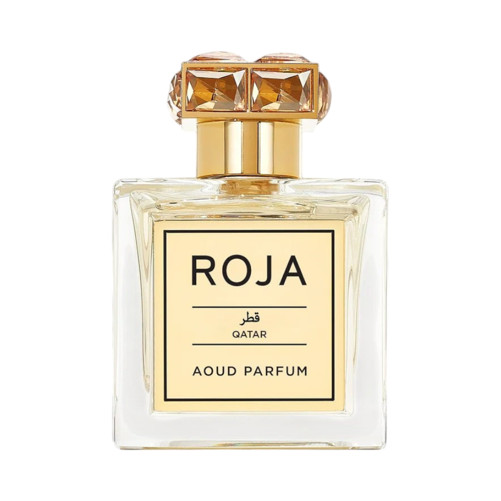 CR Signature Roja Parfums Qatar Aoud Parfum in a clear glass bottle with a gold label and ornate crystal cap.